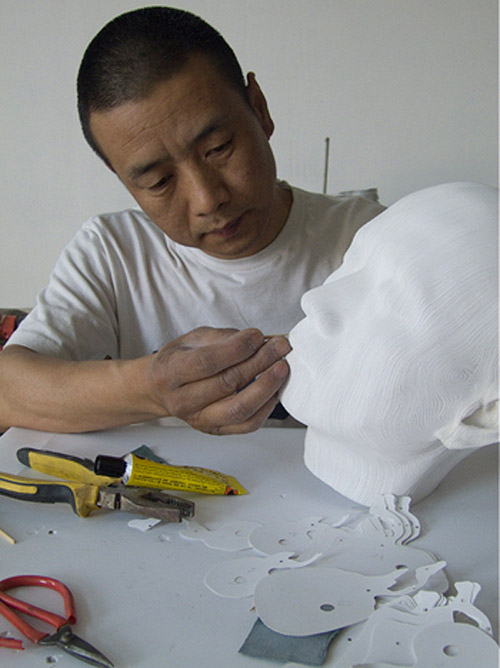 Amazing paper sculpture of heads, topographic, Chinese contemporary art, rotated head