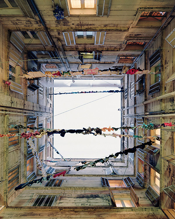 Spanish photographer, Marie Bovo, Marseille courtyard photos, hanging laundry, collabcubed