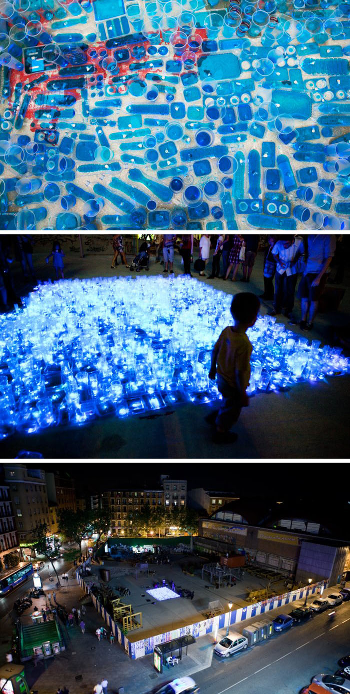 Protest and celebration of pool in Madrid, cool light installation, luzinterruptus, guerilla art collective, street art