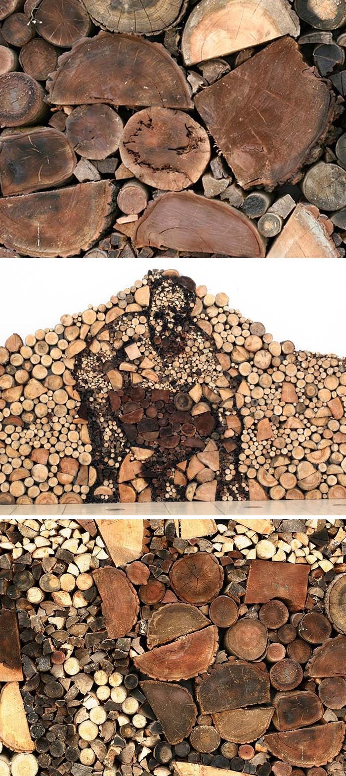 Installation using logs with silouhette of a crouching man, cool installation, Contemporary Hungarian Art, Gyula Varnai