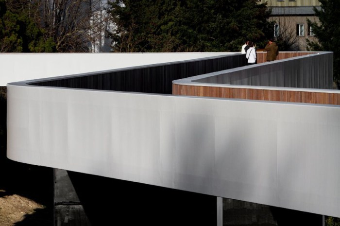 Sleek pedestrian bridge in Coviha Portugal by JLCG Arquitectos, contemporary architecture, bridge design