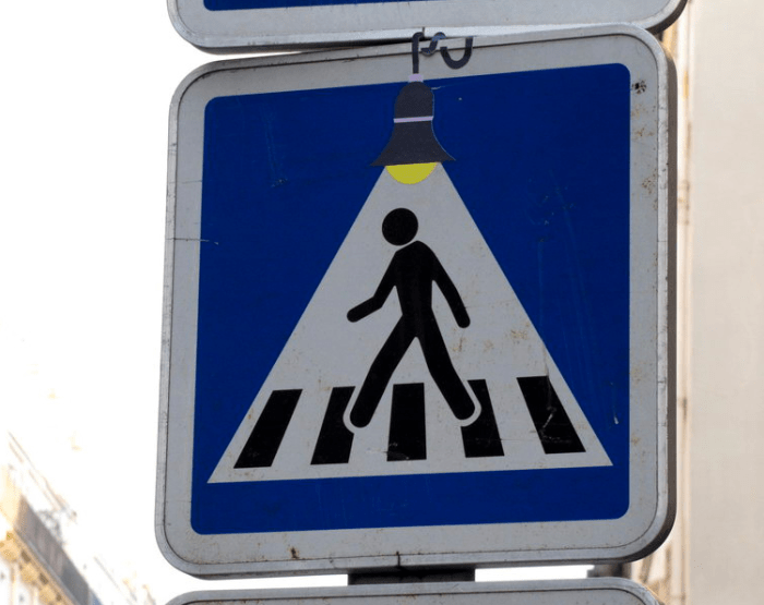 Street art in Europe, Traffic signs altered with stickers to make humorous images, Clet Abraham, Graffiti