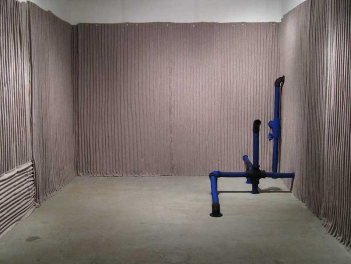 Soft sculptures made with felt of industrial objects such as pipes, faucets, hinges, and tools by Johanna Unzueta, Chilean artist