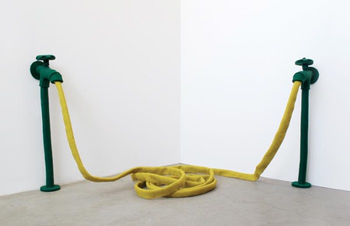 Soft sculptures made with felt of industrial objects such as pipes, faucets, hinges, and tools by Johanna Unzueta, Chilean artist