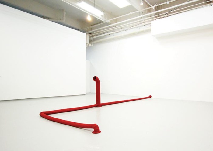 Soft sculptures made with felt of industrial objects such as pipes, faucets, hinges, and tools by Johanna Unzueta, Chilean artist