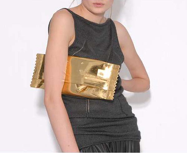 Avant Garde Fashion, Trompe l'oeil design, Martin Margiela candy wrapper clutch, fishnet leggings, keyring necklace, belt jacket, H&M