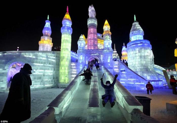 Harbin Ice Festival 2013 in China, Ice slides lit with LED's, Ice Castles with slides, cool and fun