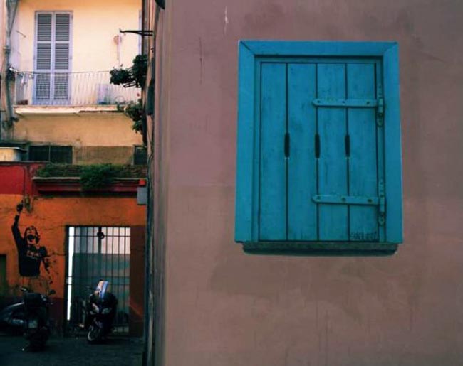 Sbagliato, window wheat pastings from Roman street art collective Sbagliato. Graffiti, street art, wheat paste, doors and windows