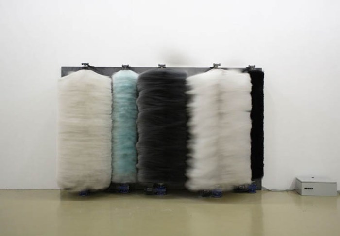 Lara Favaretto, Italian conceptual artist, car wash brush installations, confetti-blowing fans, oxygen tanks that blow party favors