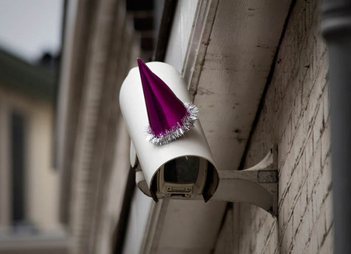 Surveillance Cameras with party hats in Utrecht, Netherlands, in honor of George Orwell's Birthday, Front404, street art