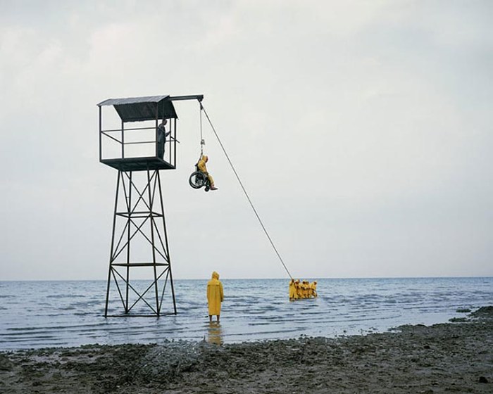 Oded Hirsch, 50 Blue, Video and Stills, wheelchair lifted by pulley to see view, contemporary Israeli art