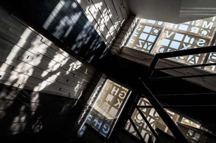 Gooyesh Language Institute, Contemporary Iranian Architecture, Typographic exterior facade and gates, Ali Karbaschi architect, Cool building exterior with alphabet cutouts