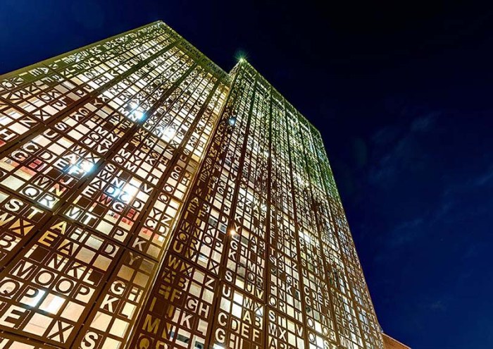 Gooyesh Language Institute, Contemporary Iranian Architecture, Typographic exterior facade and gates, Ali Karbaschi architect, Cool building exterior with alphabet cutouts