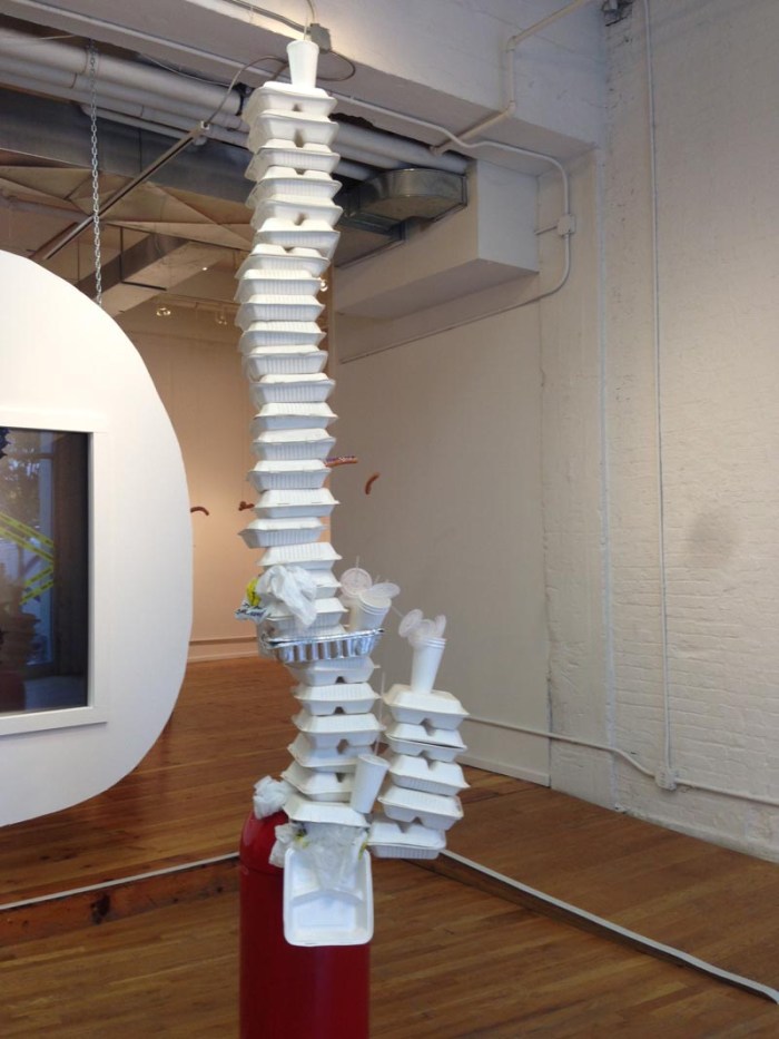 Rune Olsen, Will to Power exhibit at La Mama Gallery, NYC. Endless Column, Tower of styrofoam takeout containers, Humorous Sculpture
