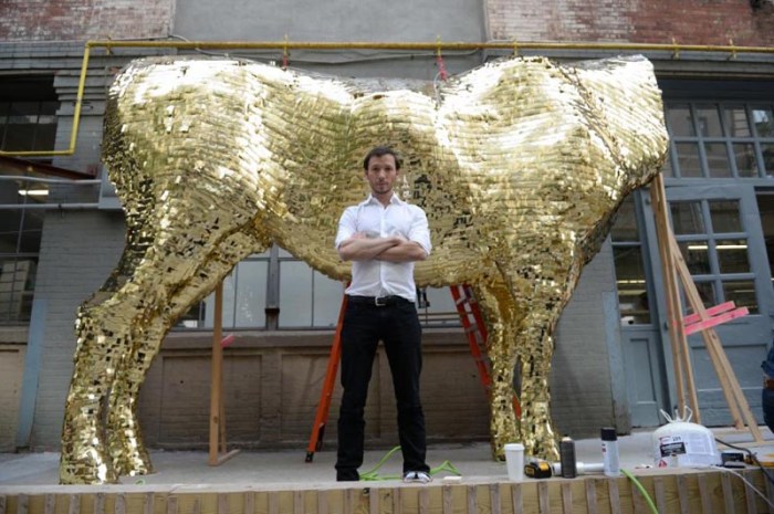 Cash Cow pinata by sebastian errazuriz, golden calf filled with 1000 dollars for NYCxDesign Festival, Industry City, 2014 Wanted Design