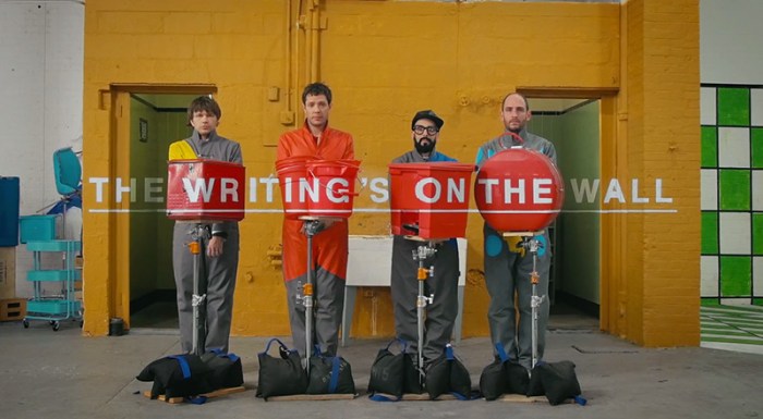 OK Go's video for The Writing's on the Wall with anamorphic effects, cool sets, cool video