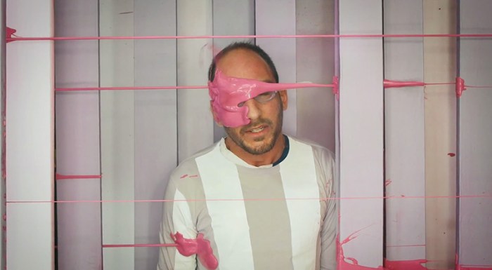 OK Go's video for The Writing's on the Wall with anamorphic effects, cool sets, cool video